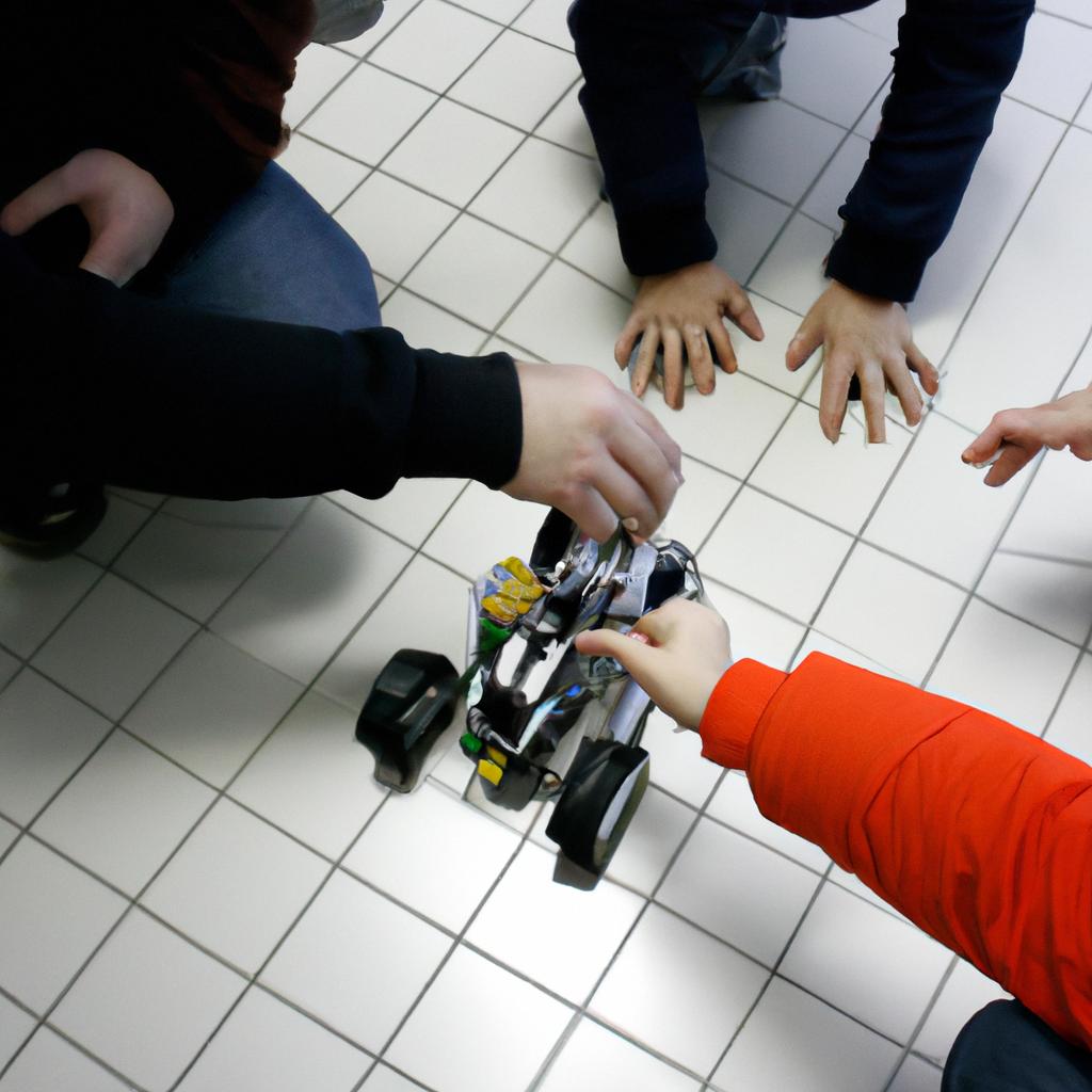 Person teaching children robotics skills