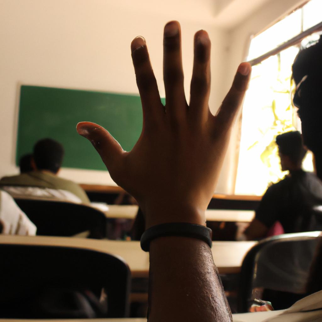 Person raising hand in classroom